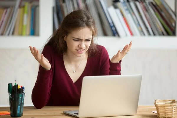 frustrated girl on laptop